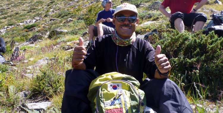 A smiling Dorje Khatri gives the thumbs up on the way to Cho Oyu